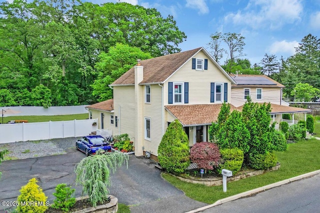 908 Green Grove Rd, Ocean Twp, NJ 07712 - view of front of home featuring a shingled roof and a chimney