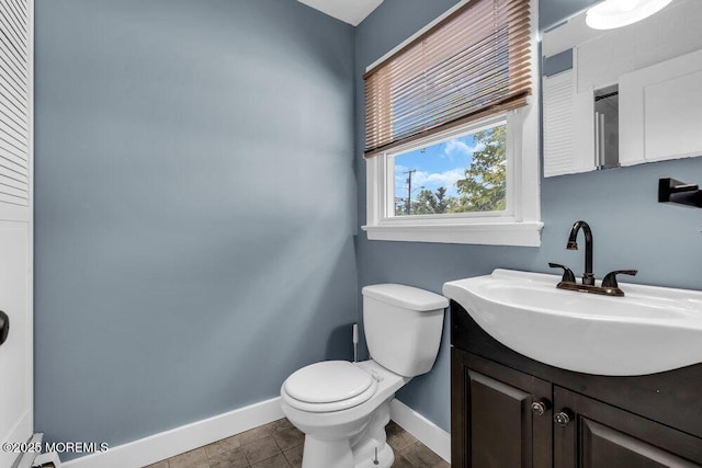 908 Green Grove Rd, Ocean Twp, NJ 07712 - bathroom featuring baseboards, toilet, and vanity