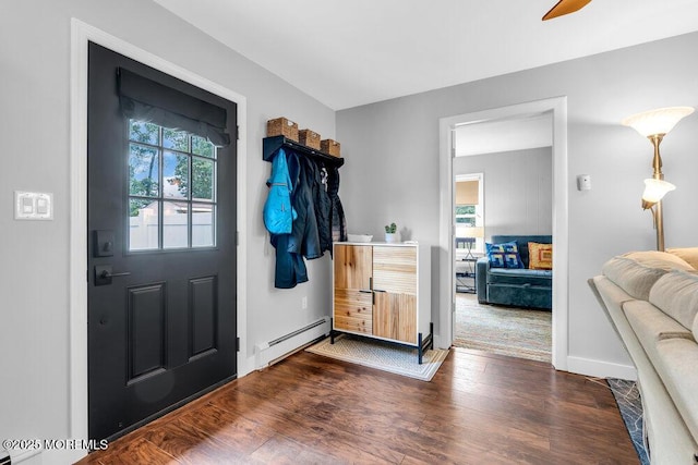 908 Green Grove Rd, Ocean Twp, NJ 07712 - entrance foyer with dark wood-style floors, a baseboard heating unit, and baseboards