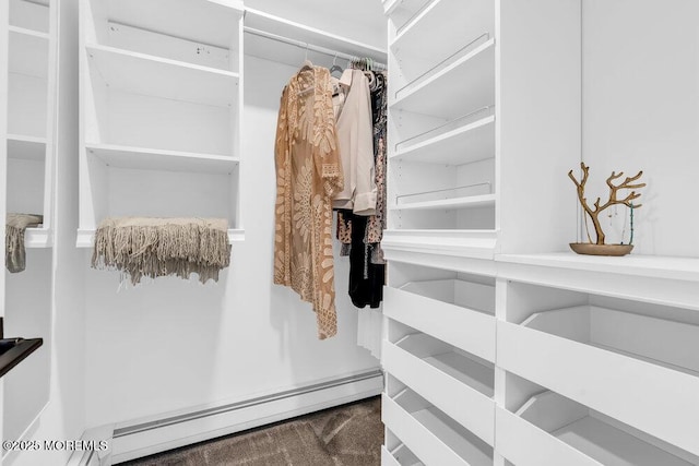 908 Green Grove Rd, Ocean Twp, NJ 07712 - walk in closet featuring a baseboard heating unit and carpet