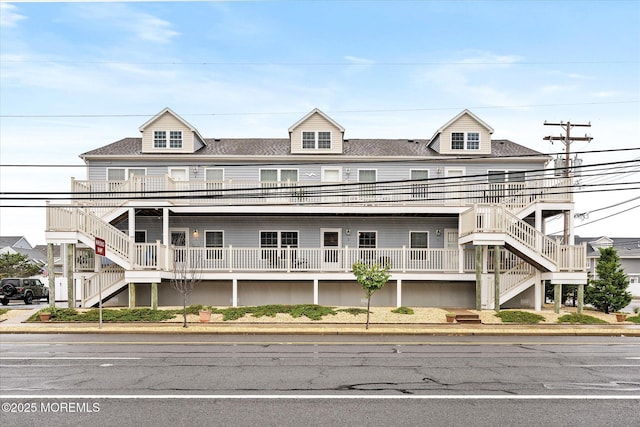 2033 Rte 35 Unit 3, Seaside Heights, NJ 08751 - townhome / multi-family property with stairway and a shingled roof