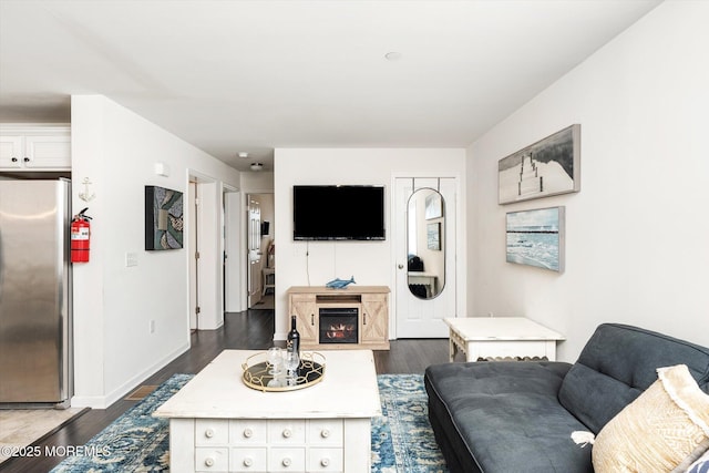2033 Rte 35 Unit 3, Seaside Heights, NJ 08751 - living area featuring dark wood-type flooring and baseboards
