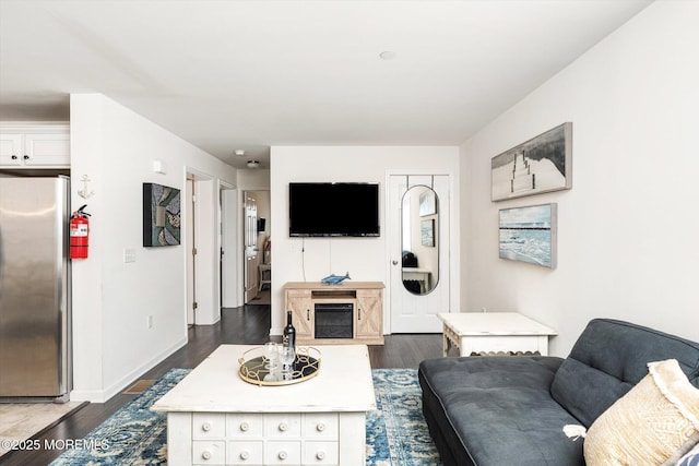 2033 Rte 35 Unit 3, Seaside Heights, NJ 08751 - living room featuring dark wood-type flooring and baseboards