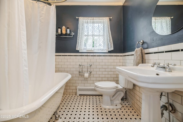 13 Poplar Ave, Fair Haven, NJ 07704 - full bathroom with a baseboard radiator, a freestanding tub, toilet, tile walls, and wainscoting
