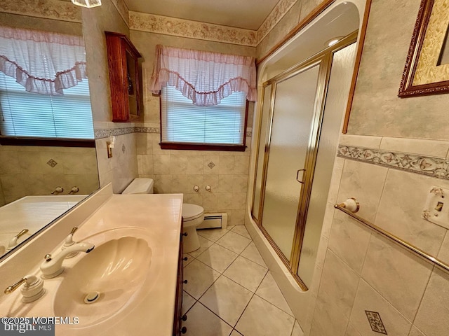 504 Windsor St, Forked River, NJ 08731 - bathroom with tile walls, tile patterned floors, toilet, a shower stall, and vanity