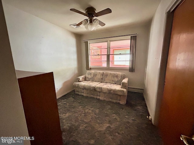 504 Windsor St, Forked River, NJ 08731 - sitting room featuring a baseboard heating unit, carpet floors, a ceiling fan, and baseboards