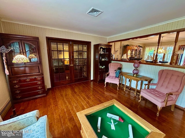 504 Windsor St, Forked River, NJ 08731 - living area with french doors, hardwood / wood-style flooring, wallpapered walls, crown molding, and baseboards