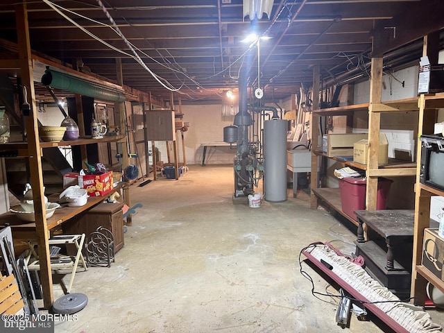 504 Windsor St, Forked River, NJ 08731 - unfinished basement featuring water heater and a sink