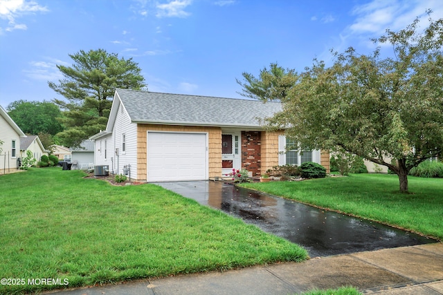 4 Olympus Way, Brick, NJ 08724 - view of front of house with driveway, cooling unit, a garage, roof with shingles, and a front yard