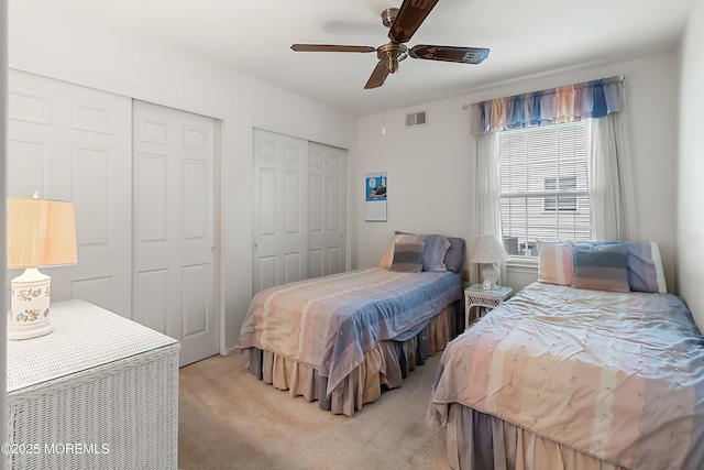 4 Olympus Way, Brick, NJ 08724 - bedroom with multiple closets, light colored carpet, and a ceiling fan