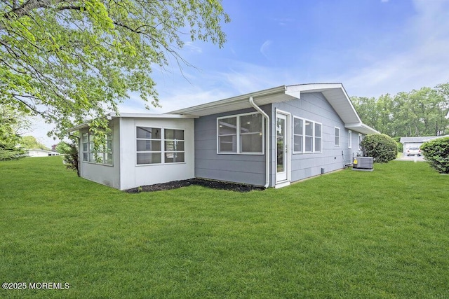85 Central Blvd, Brick, NJ 08724 - view of property exterior featuring central AC and a lawn