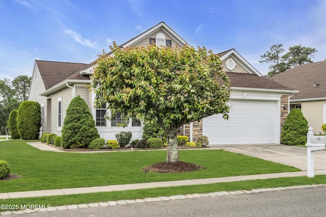 46 Pancoast Rd, Waretown, NJ 08758 - obstructed view of property featuring stone siding, driveway, a shingled roof, and a front lawn