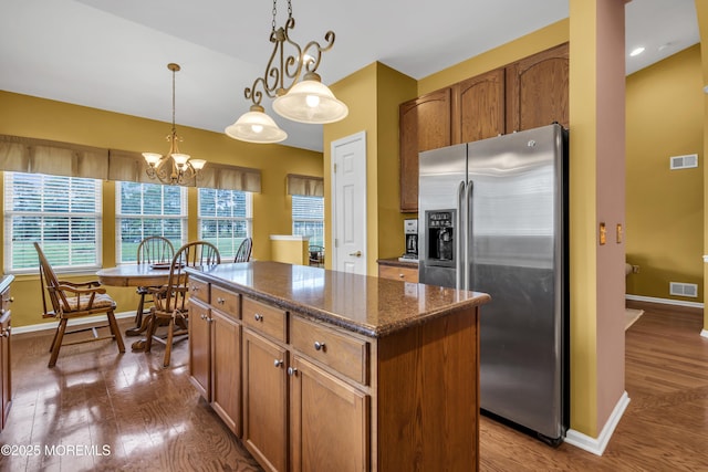 46 Pancoast Rd, Waretown, NJ 08758 - kitchen featuring stainless steel refrigerator with ice dispenser, dark wood-style floors, and a center island