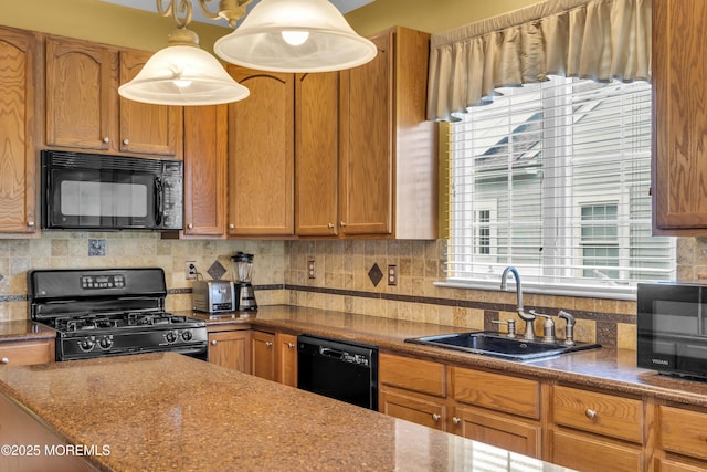 46 Pancoast Rd, Waretown, NJ 08758 - kitchen with black appliances, a sink, decorative backsplash, brown cabinets, and hanging light fixtures