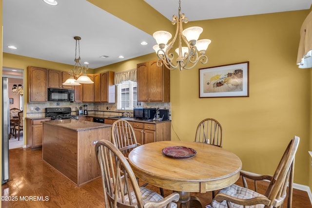 46 Pancoast Rd, Waretown, NJ 08758 - dining area featuring dark wood-style flooring, a chandelier, recessed lighting, and baseboards