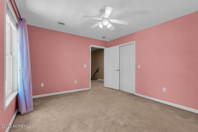 85 Main Bayway, Toms River, NJ 08753 - unfurnished bedroom featuring carpet floors, baseboards, ceiling fan, and a closet