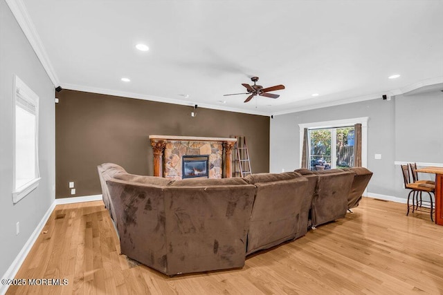 85 Main Bayway, Toms River, NJ 08753 - living area with a ceiling fan, light wood-style flooring, a fireplace, crown molding, and baseboards