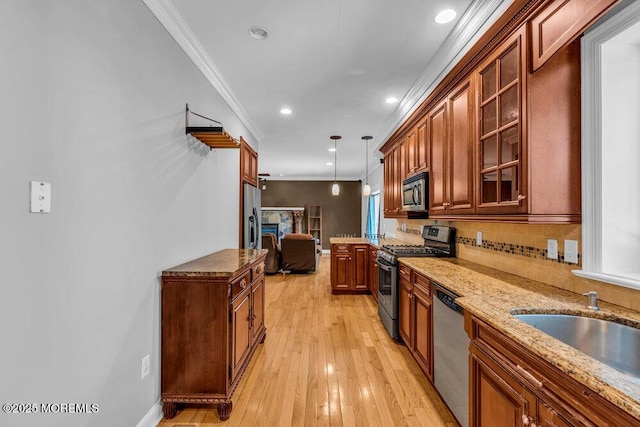 85 Main Bayway, Toms River, NJ 08753 - kitchen featuring stainless steel appliances, crown molding, decorative light fixtures, glass insert cabinets, and decorative backsplash