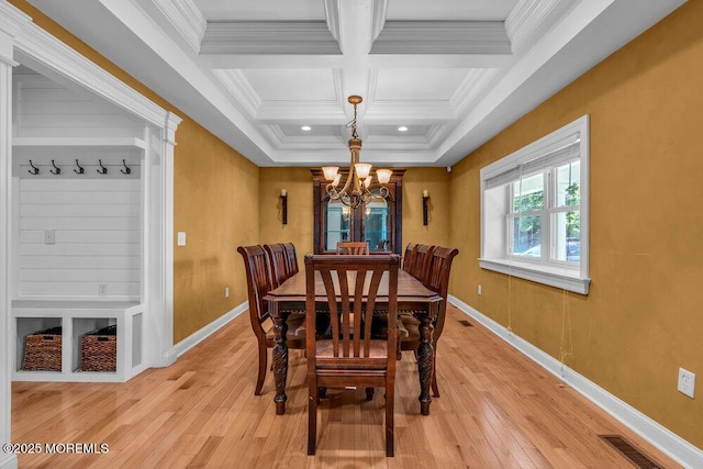 85 Main Bayway, Toms River, NJ 08753 - dining room featuring a chandelier, coffered ceiling, ornamental molding, light wood finished floors, and baseboards