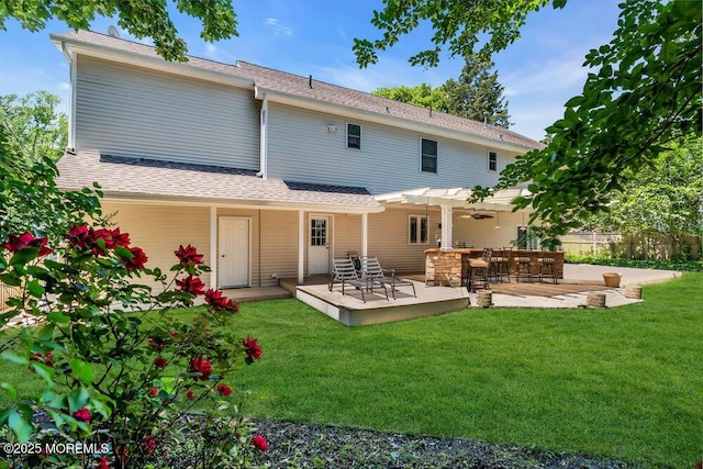 85 Main Bayway, Toms River, NJ 08753 - back of house with a pergola, a wooden deck, a shingled roof, and a patio area