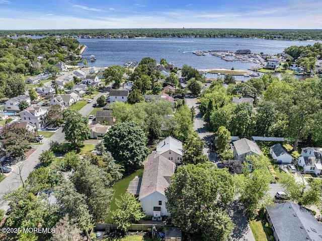 85 Main Bayway, Toms River, NJ 08753 - aerial view of property's location with nearby suburban area, a large body of water, and a tree filled landscape