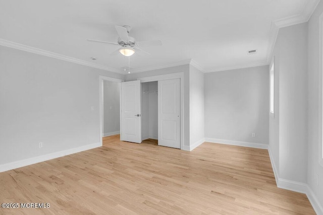 909 Leighton Ave, Point Pleasant, NJ 08742 - unfurnished bedroom featuring crown molding, light wood-style floors, baseboards, a closet, and ceiling fan