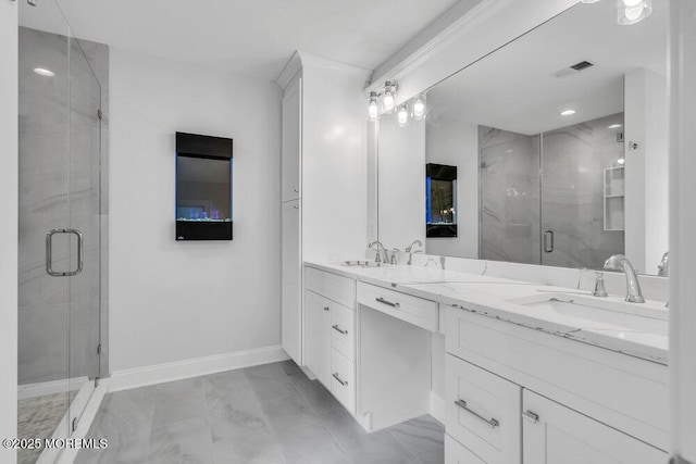 909 Leighton Ave, Point Pleasant, NJ 08742 - bathroom featuring marble finish flooring, double vanity, a stall shower, and baseboards