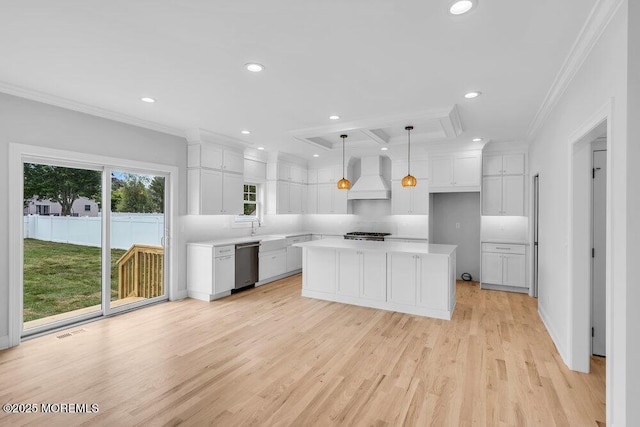 909 Leighton Ave, Point Pleasant, NJ 08742 - kitchen with dishwasher, premium range hood, recessed lighting, ornamental molding, and white cabinetry