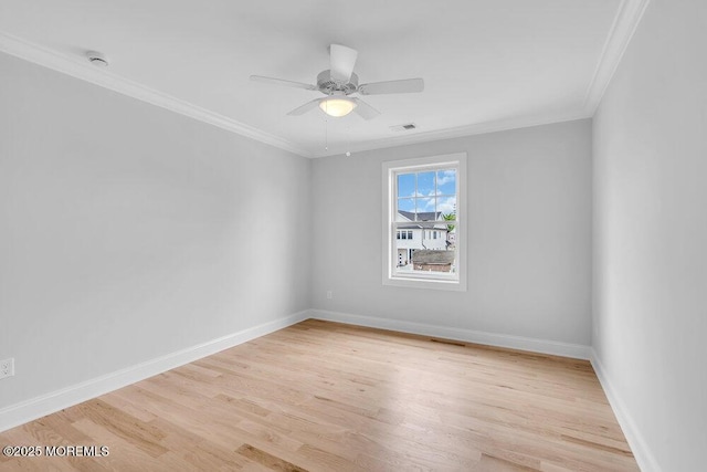 909 Leighton Ave, Point Pleasant, NJ 08742 - empty room featuring ornamental molding, light wood finished floors, baseboards, a ceiling fan, and a smoke detector