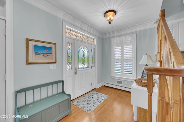 842 E Ave, Bay Head, NJ 08742 - foyer featuring crown molding, light wood-style floors, a baseboard radiator, and stairway