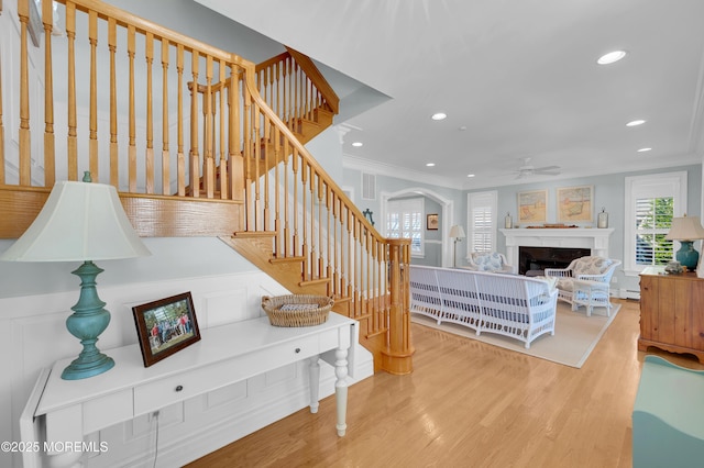 842 E Ave, Bay Head, NJ 08742 - stairway with ornamental molding, recessed lighting, a ceiling fan, wood finished floors, and arched walkways