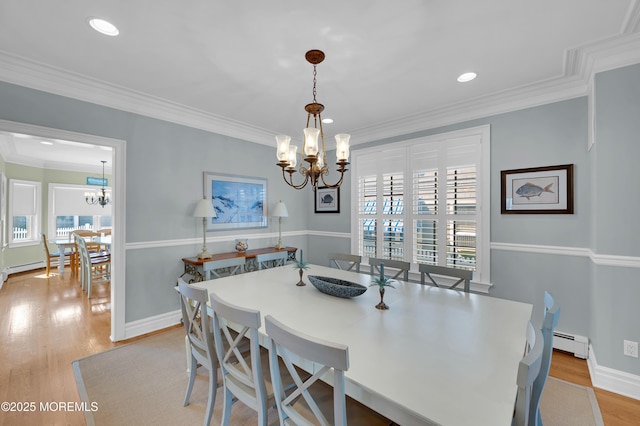 842 E Ave, Bay Head, NJ 08742 - dining space featuring a chandelier, light wood-style flooring, a baseboard heating unit, recessed lighting, and ornamental molding
