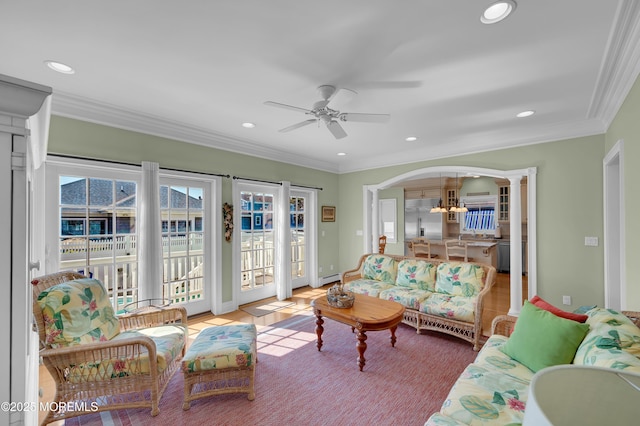 842 E Ave, Bay Head, NJ 08742 - living room featuring a ceiling fan, recessed lighting, crown molding, a chandelier, and arched walkways