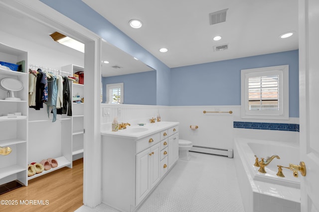 842 E Ave, Bay Head, NJ 08742 - full bath with a baseboard heating unit, a wainscoted wall, vanity, a bath, and toilet