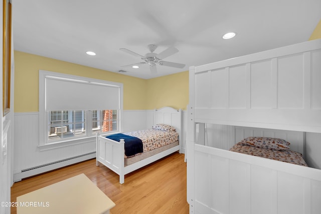 842 E Ave, Bay Head, NJ 08742 - bedroom featuring a baseboard radiator, a wainscoted wall, light wood finished floors, recessed lighting, and a ceiling fan