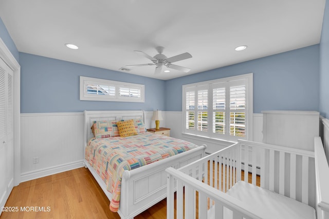842 E Ave, Bay Head, NJ 08742 - bedroom with a wainscoted wall, wood finished floors, ceiling fan, and recessed lighting