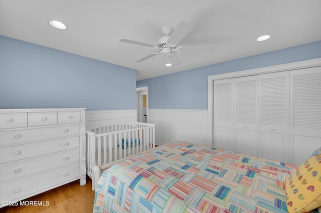 842 E Ave, Bay Head, NJ 08742 - bedroom with wainscoting, a closet, recessed lighting, wood finished floors, and a ceiling fan