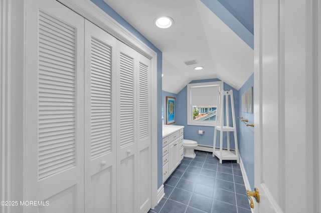 842 E Ave, Bay Head, NJ 08742 - full bath with a closet, toilet, baseboards, vaulted ceiling, and vanity