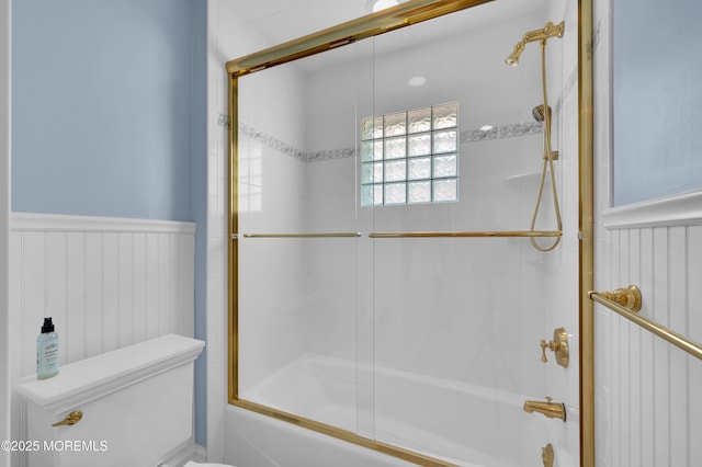 842 E Ave, Bay Head, NJ 08742 - bathroom featuring toilet, enclosed tub / shower combo, and wainscoting
