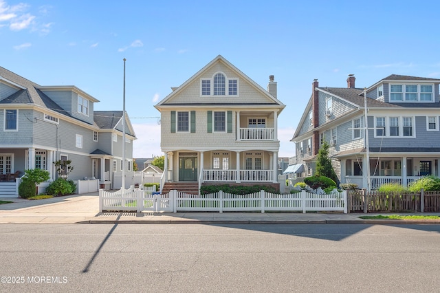 842 E Ave, Bay Head, NJ 08742 - view of front of property with a porch, a fenced front yard, a gate, and a residential view