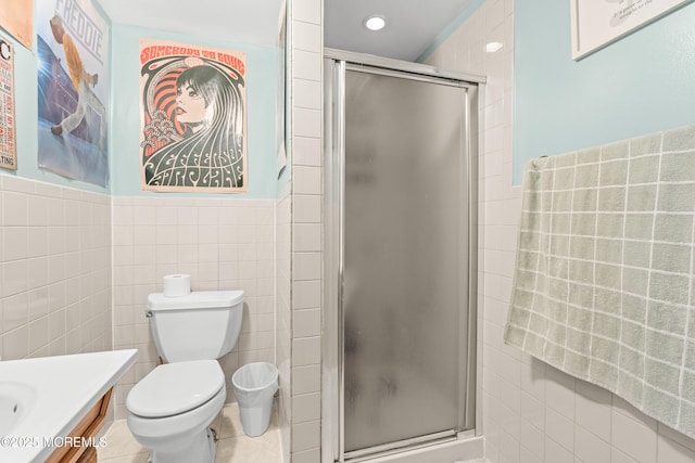 175 W Shore Ave, Bogota, NJ 07603 - full bathroom featuring tile walls, a stall shower, vanity, and toilet