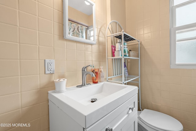 175 W Shore Ave, Bogota, NJ 07603 - bathroom with tile walls, toilet, and vanity