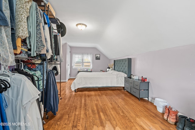 175 W Shore Ave, Bogota, NJ 07603 - bedroom featuring lofted ceiling, wood finished floors, and baseboards