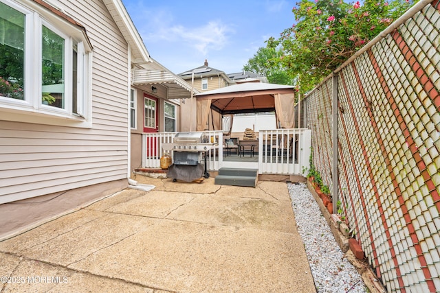 175 W Shore Ave, Bogota, NJ 07603 - fenced backyard featuring a gazebo, a patio area, a deck, and grilling area