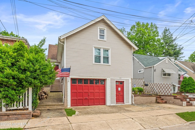 175 W Shore Ave, Bogota, NJ 07603 - view of front of property featuring concrete driveway and an attached garage