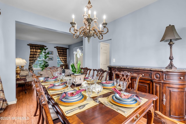 104 Plumstead Dr, Freehold, NJ 07728 - dining room featuring a chandelier and light wood-style floors