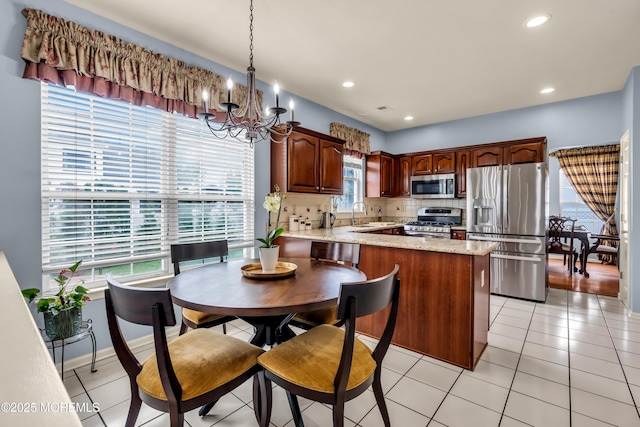 104 Plumstead Dr, Freehold, NJ 07728 - dining room featuring a chandelier, recessed lighting, and light tile patterned floors