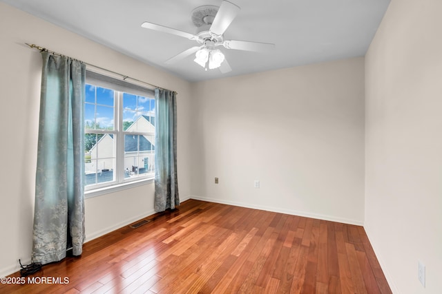 104 Plumstead Dr, Freehold, NJ 07728 - unfurnished room with hardwood / wood-style flooring, baseboards, and ceiling fan