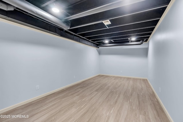 104 Plumstead Dr, Freehold, NJ 07728 - finished below grade area featuring wood finished floors and baseboards