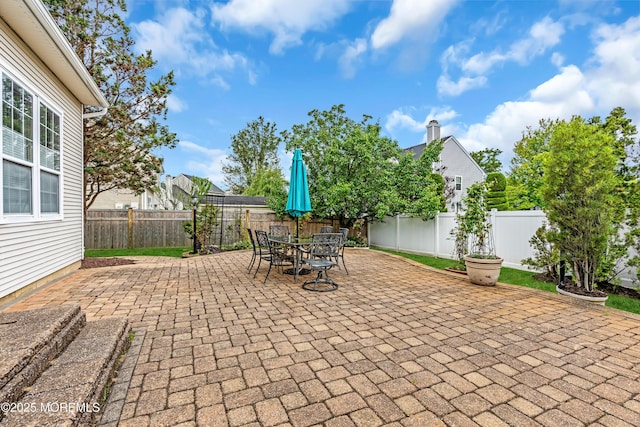 104 Plumstead Dr, Freehold, NJ 07728 - fenced backyard with a patio